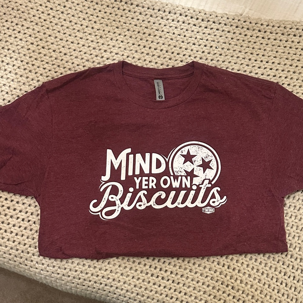 Women’s Maroon Graphic T-Shirt “Mind Yer Own Biscuits” size Medium. NEW